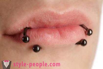 Lip piercing: pakinabang at disadvantages